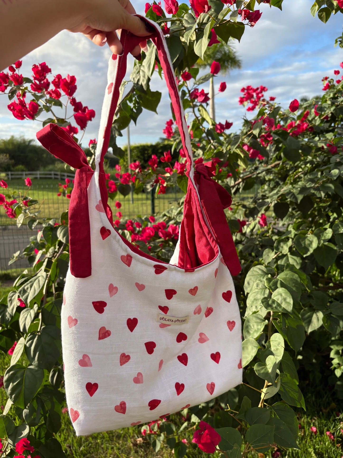 lucky in love bow bag